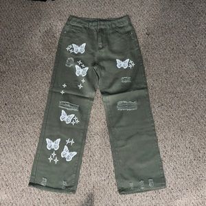 Brand new flare jeans color green with butterfly prints!